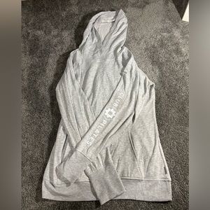 Gray Pocket hoodie with Club Pilates logo